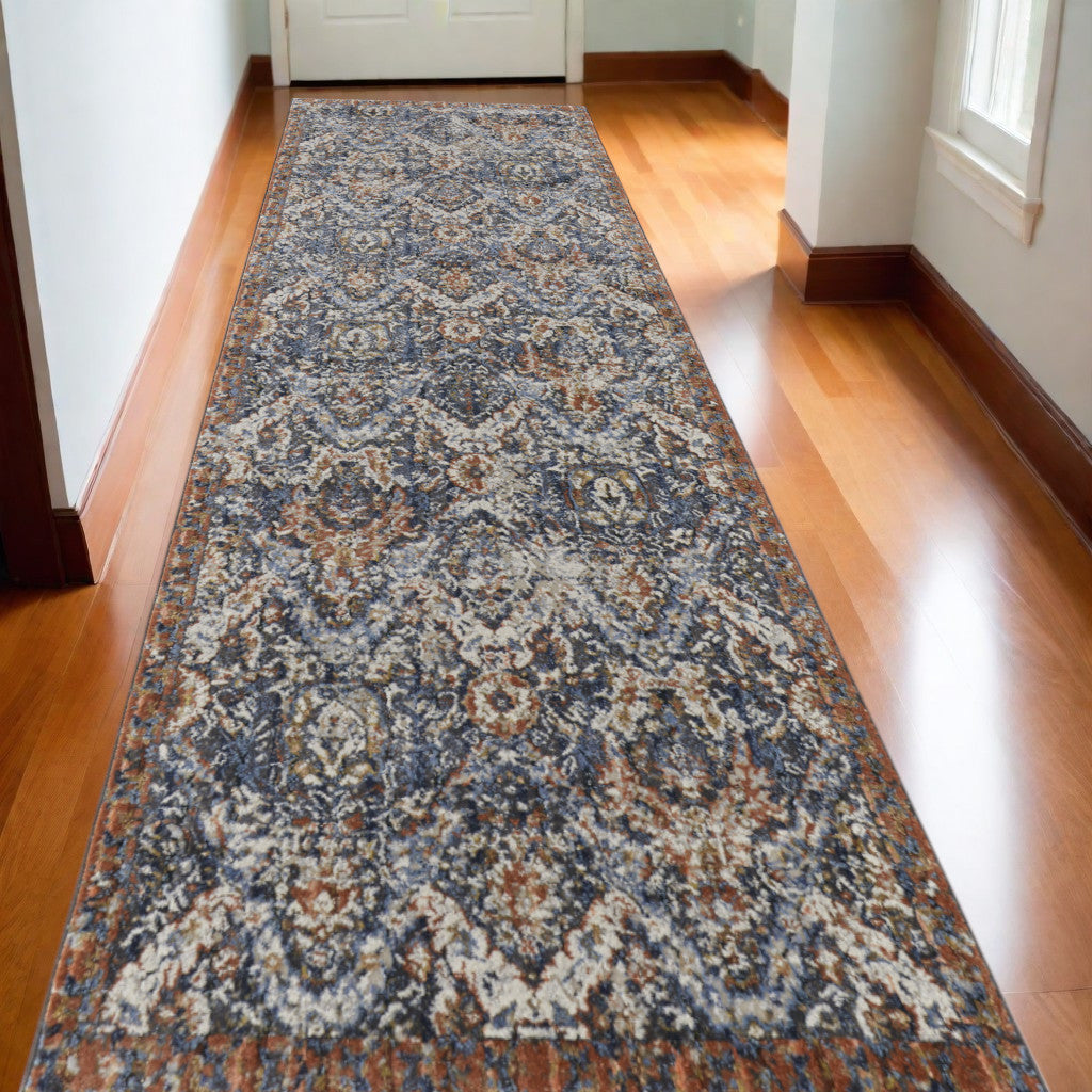 10' Blue Orange And Ivory Floral Power Loom Runner Rug With Fringe