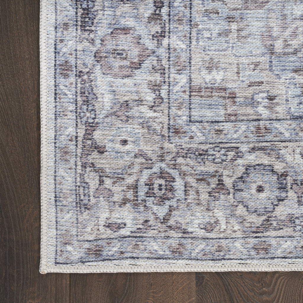 10' Beige and Ivory Floral Power Loom Distressed Washable Runner Rug