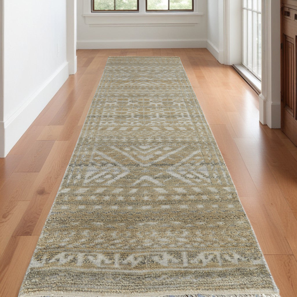 10' Gold and Tan Geometric Hand Knotted Worn Faded Runner Rug