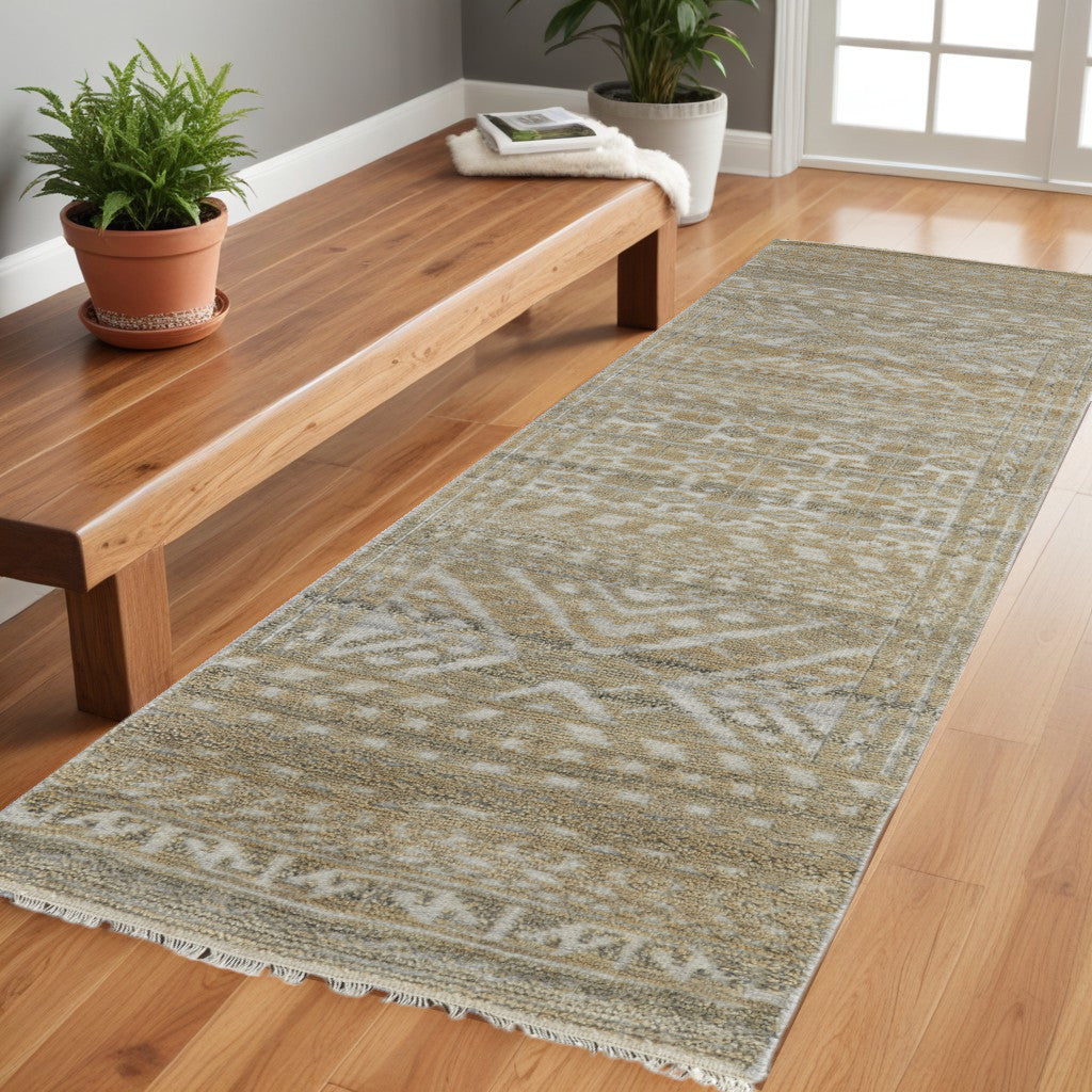 10' Gold and Tan Geometric Hand Knotted Worn Faded Runner Rug